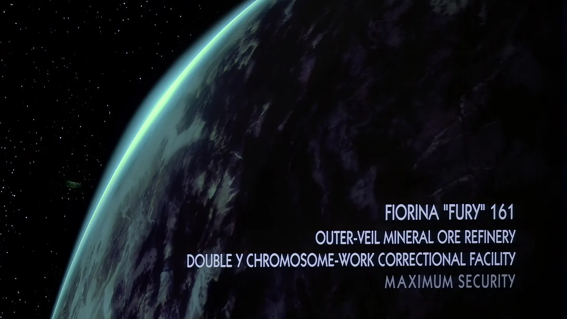Planet Fiorina 'Fury' 161 seen from orbit, with on-screen text describing the maximum-security correctional facility